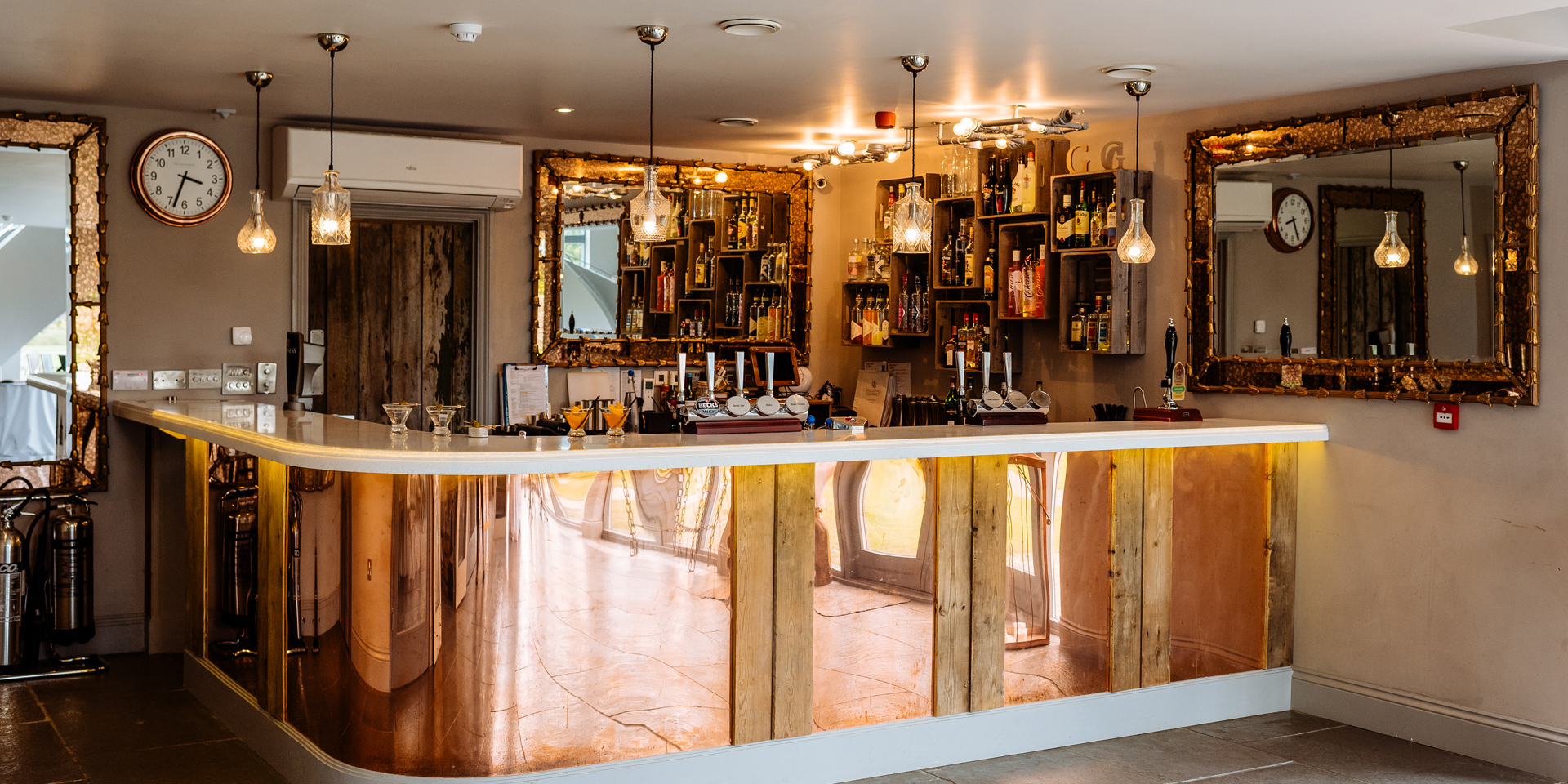The stylish copper bar at Blackwell Grange wedding venue